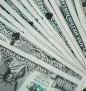 Closeup of novelty one million dollar bills laid out in a fan arrangement.