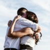 man and woman hugging each other photography