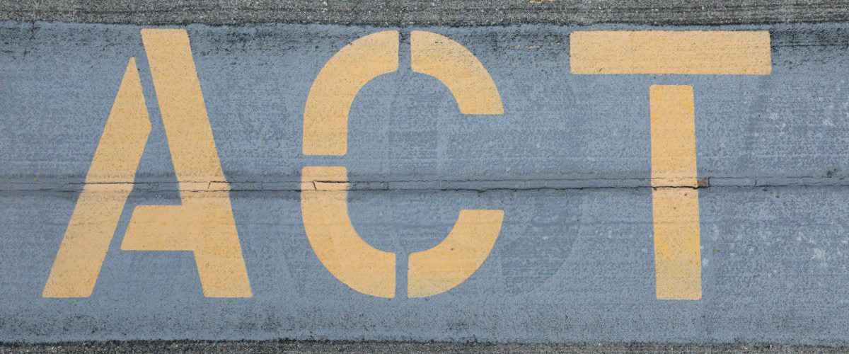 blue and white love print on gray concrete wall
