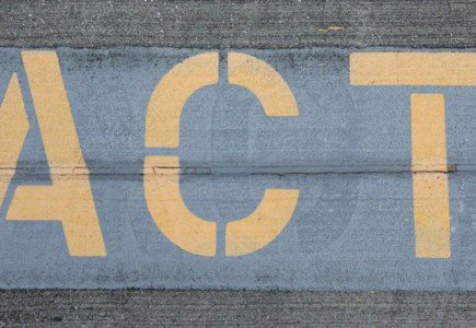 blue and white love print on gray concrete wall