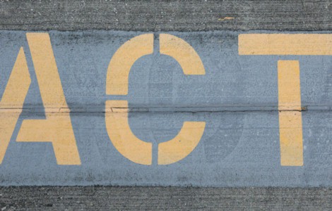 blue and white love print on gray concrete wall