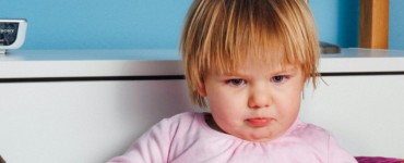 boy wearing pink long-sleeved top
