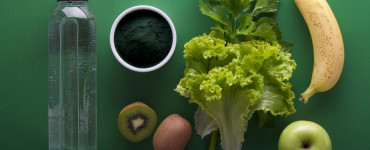 assorted fruits and vegetables on green surface