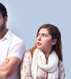 a man and woman posing for a picture