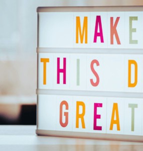 a light box that says make this day great