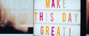 a light box that says make this day great