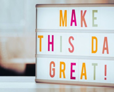 a light box that says make this day great