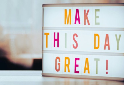 a light box that says make this day great