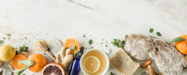 bread with sliced lemon on white ceramic plate