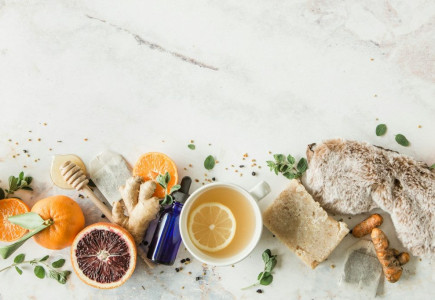 bread with sliced lemon on white ceramic plate