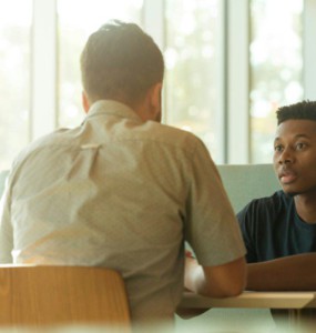 two men talking